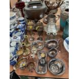 Group of assorted metalware to include silver plated goblets, samovar and other metalware.