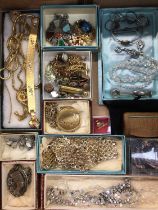 Group of vintage costume jewellery including a Miracle pendant on chain, silver rings, gilt metal ne