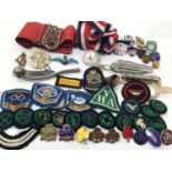 Collection of mostly Girl Guides cloth badges, enamelled pins, penknife etc, RAF silver and enamel s