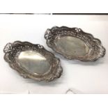 Pair of silver oval bonbon dishes with pierced decoration