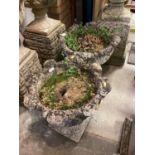 Concrete garden urn on plinth base, 86cm high, together with another pair of urns, 43.5cm high