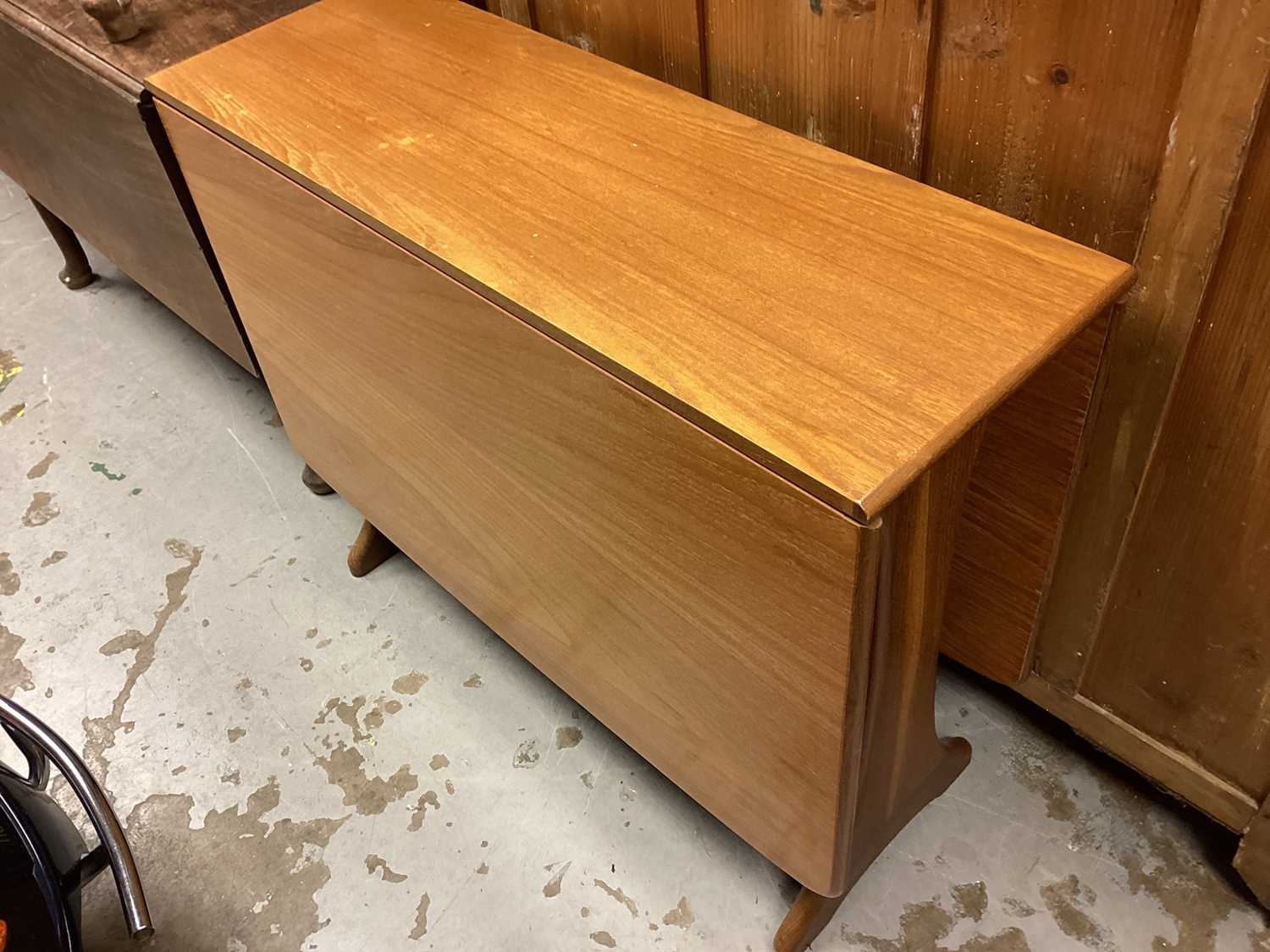 1970's teak G-Plan drop leaf table, together with a set of four dining chairs