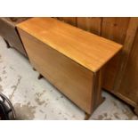 1970's teak G-Plan drop leaf table, together with a set of four dining chairs