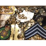 Collection of military badges and buttons
