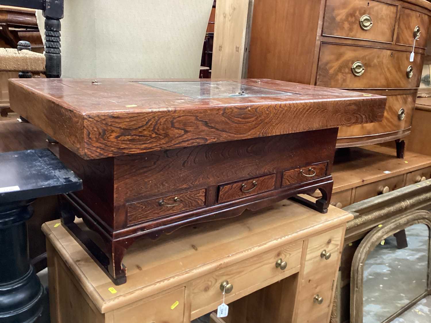 Chinese elm bijouterie coffee table with three compartments to the top and three drawers below, 108.