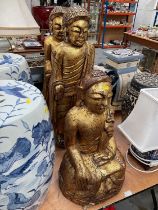 Group of three large oriental carved gilt wood figures
