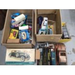 Three boxes of various toy cars and vehicles