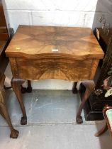 Frister & Rossmann sewing machine in a figured walnut veneered table cabinet on cabriole legs togeth