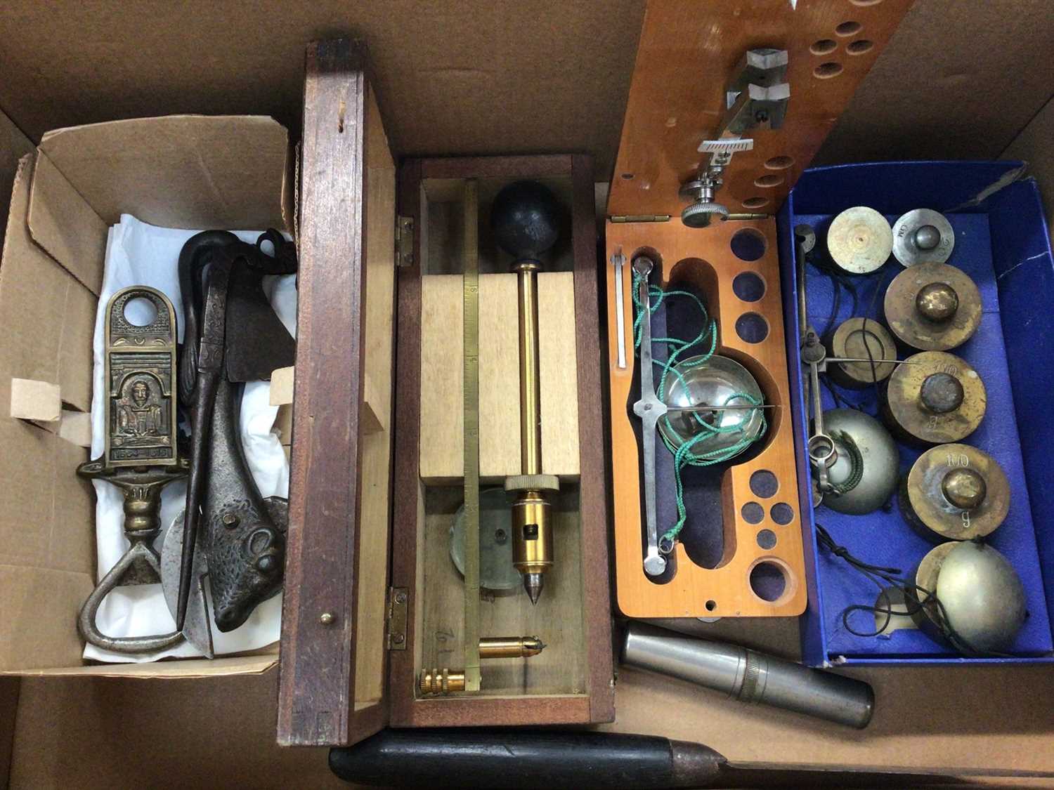 Three sets of various scales, old metal can opener in the form of a cow, brass bottle opener, quill