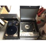 Two vintage record players together with a selection of LP records including country music and some