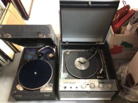 Two vintage record players together with a selection of LP records including country music and some