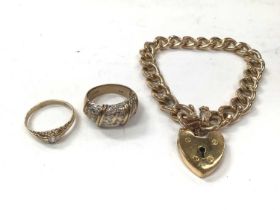 Two 9ct gold dress rings and a gold plated bracelet with padlock clasp