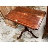 Antique mahogany tilt top wine table with inlaid decoration on turned column and three splayed legs