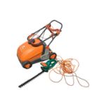 Flymo lawnrake compact 3400 together with a Bosch hedge cutter