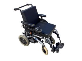 Invacare Mirage electric power wheelchair together with charger