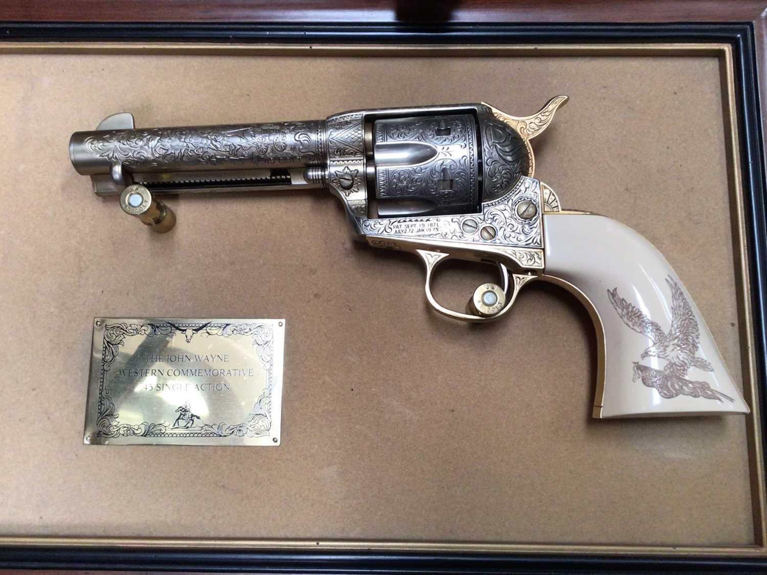 John Wayne replica gun, leather holster, various belt buckles, penknives, lighters etc - Image 2 of 5