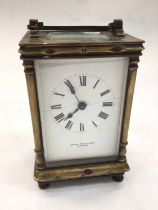 Brass carriage clock by John Pound & Co, London