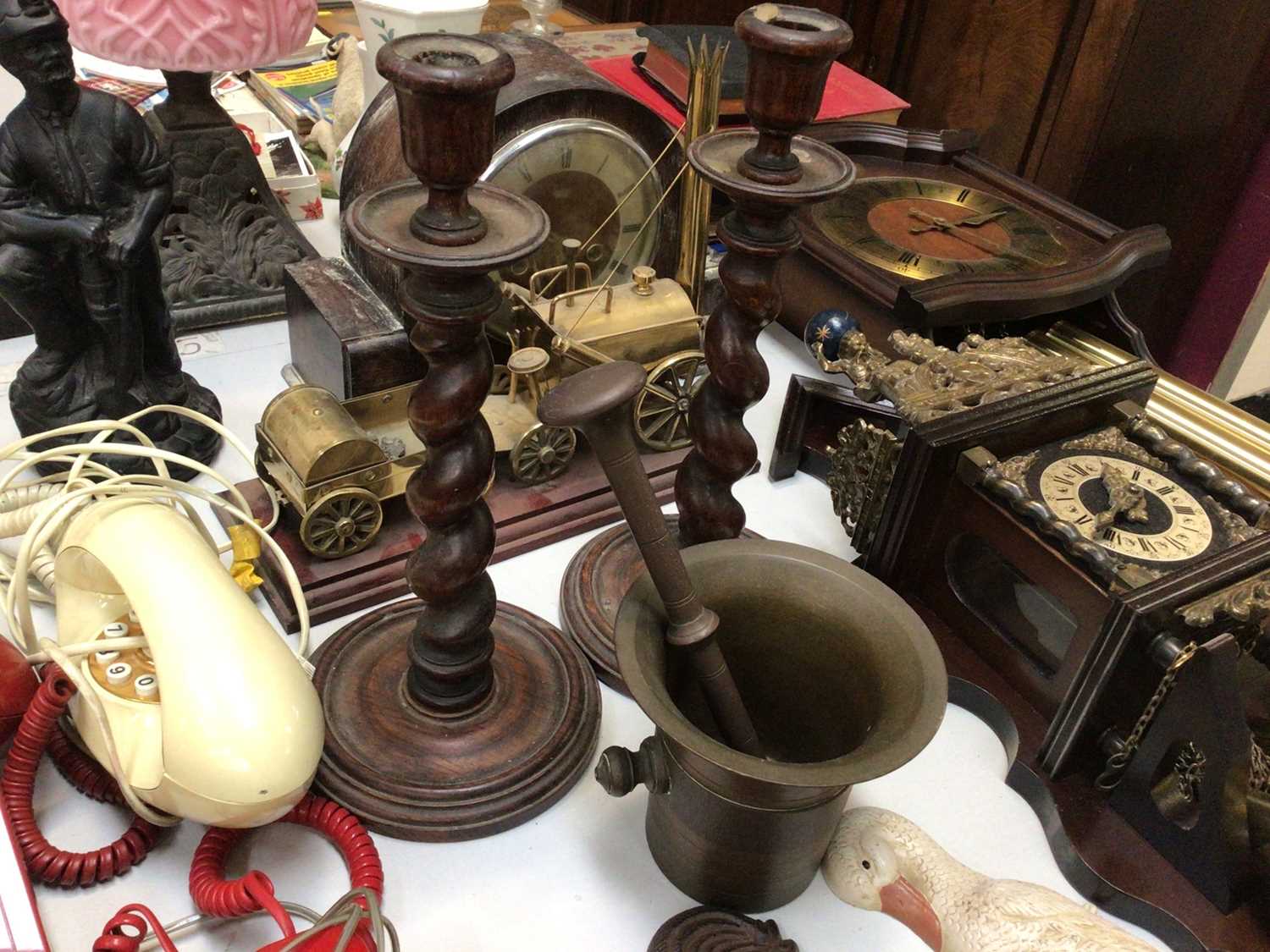 Group of vintage telephones, three wooden clocks, pair of barley twist candlesticks, box of brasswar - Image 3 of 5