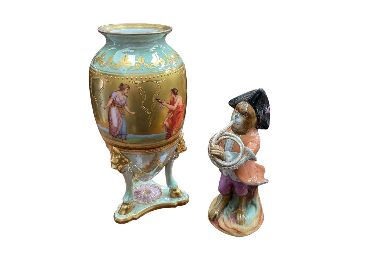 Vienna vase and a Meissen style monkey band figure