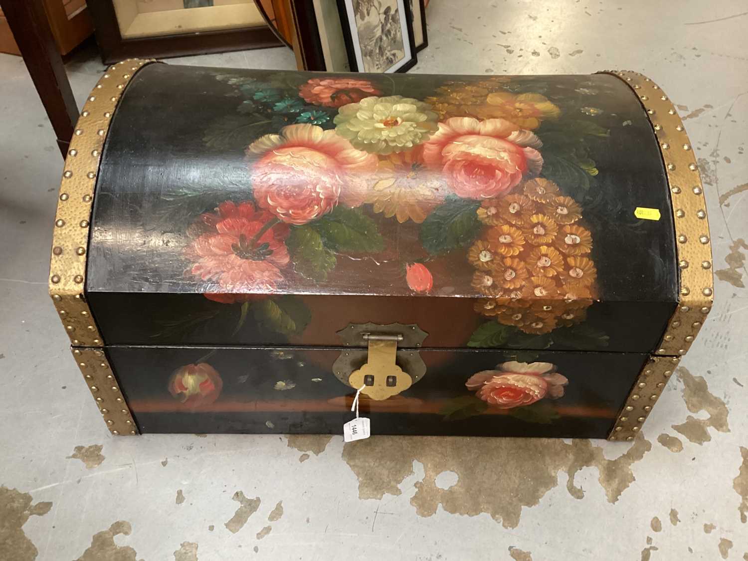 Decorative domed top trunk with hand painted floral decoration