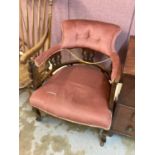 Two late Victorian/Edwardian tub chairs, one upholstered in pink and the other in blue