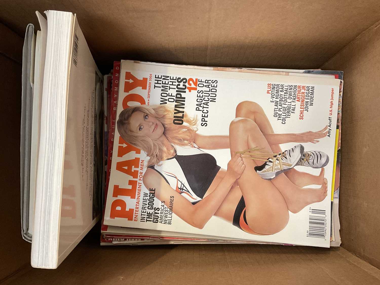 Two boxes containing Playboy magazines, FHM and similar