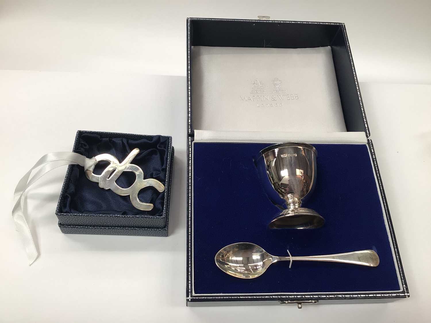 Mappin & Webb silver Christening egg cup and spoon cased set (Sheffield 1993), together with a Carrs
