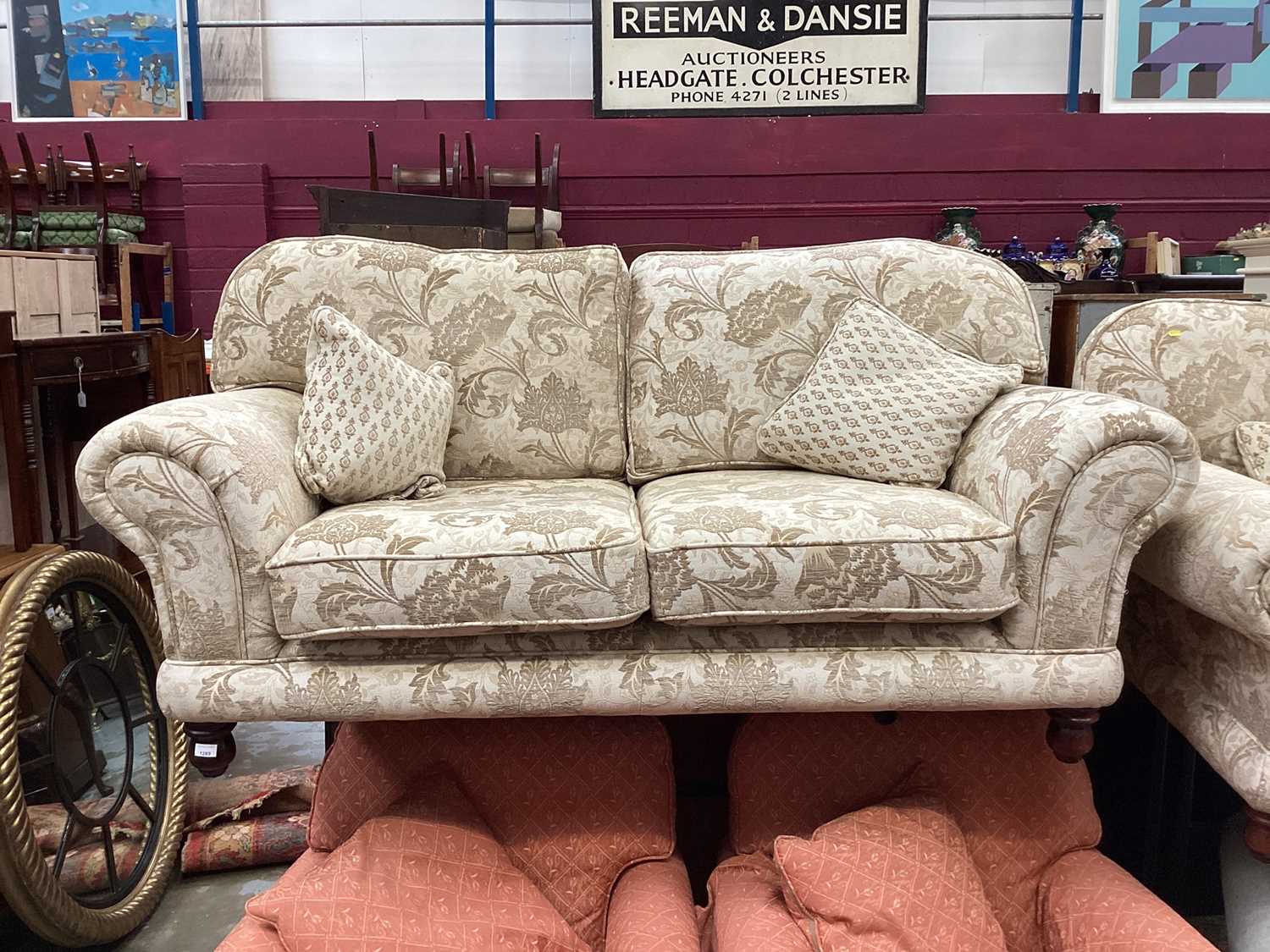 Good quality contemporary three piece suite with floral cream upholstery, comprising pair of two sea