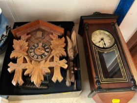 Cuckoo clock and a German wall clock (2)