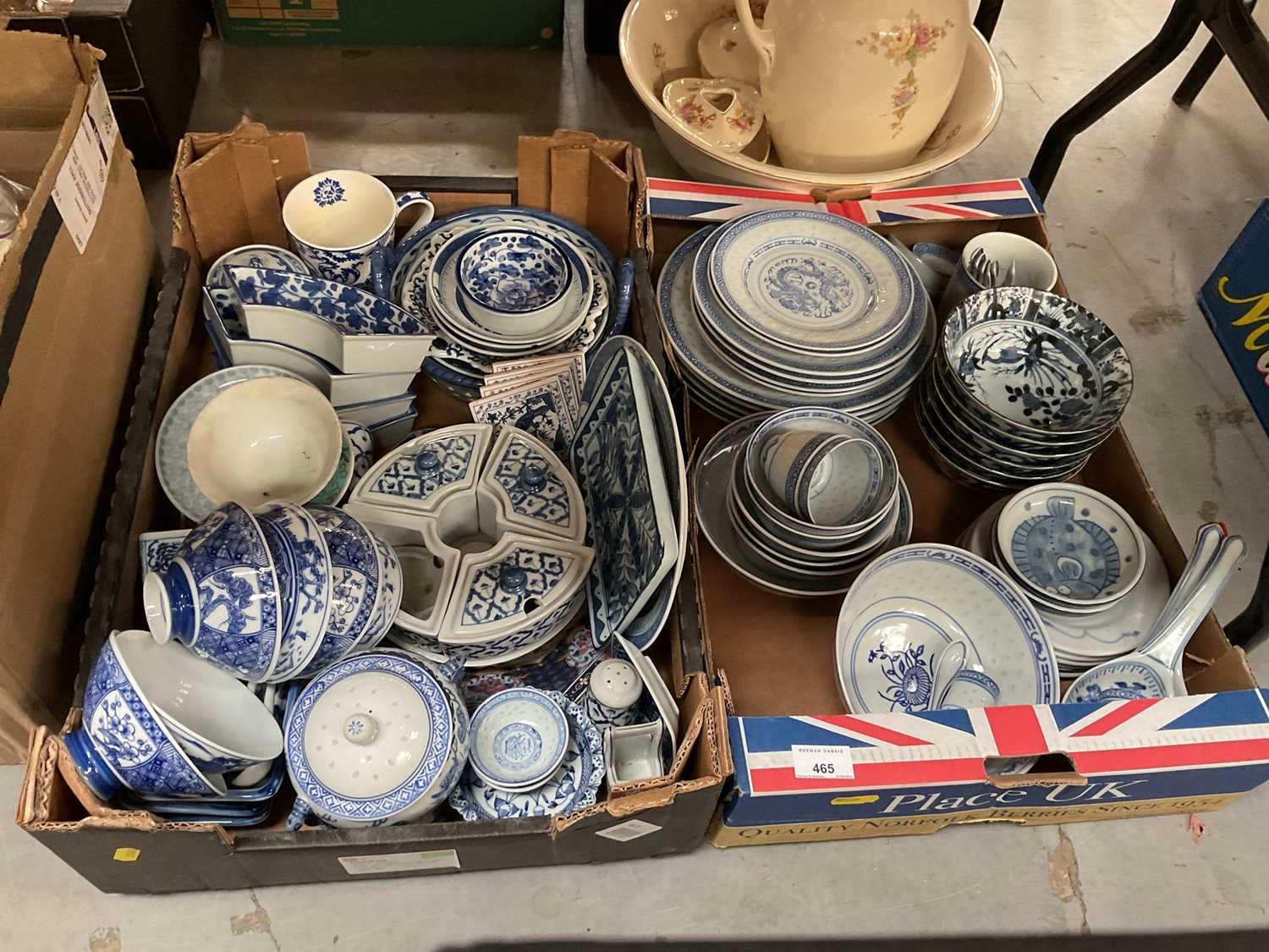 Two boxes of various blue and white oriental ceramics.