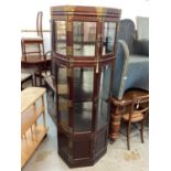 Oriental display cabinet with four bevelled glazed doors and cupboards below, 62cm wide, 66cm deep,