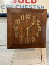 Art Deco oak wall clock with applied brass numerals, in working condition (with key and pendulum)