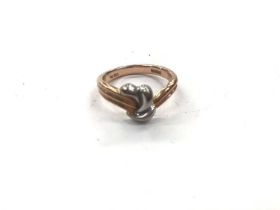 14ct rose gold ring with a white gold design, marked Wahing, size L½