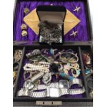 Jewellery box containing vintage and later costume jewellery, African white metal necklace, pendants