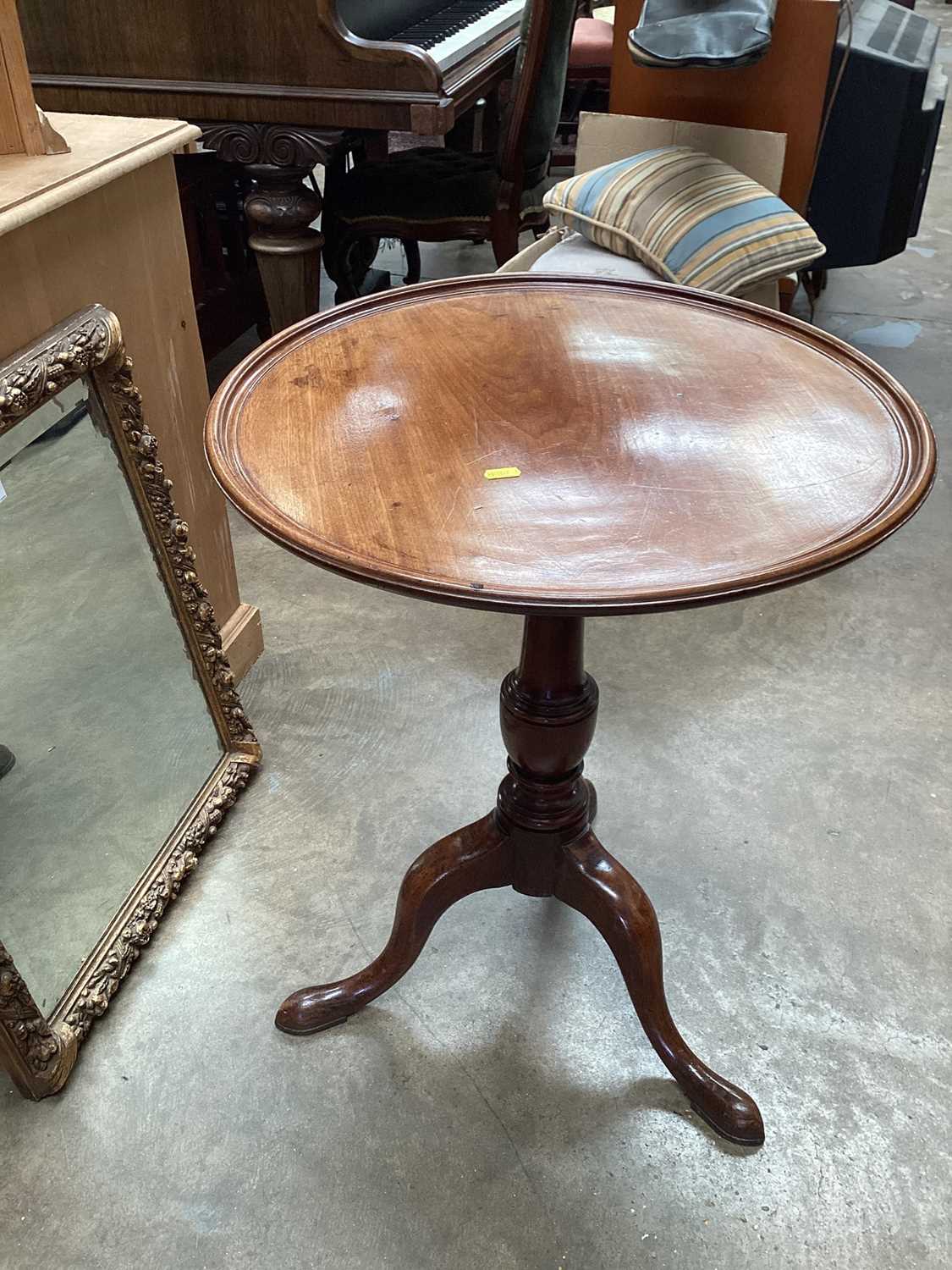 19th century mahogany wine table with circular top on turned column and tripod base, 55cm diameter