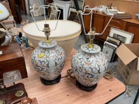 Pair of contemporary porcelain table lamps with matching shades