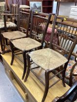 Three small rustic arts and crafts period chairs, together with similar period slender floor standin