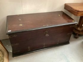 Antique colonial hardwood coffer with brass mounts raised on turned front feet, 124.5cm wide, 56cm d