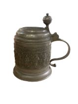 Large pewter tankard decorated in relief with the twelve apostles