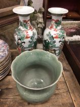 Pair of antique Chinese famille verte baluster vases, circa 1900, and a celadon vase (3)