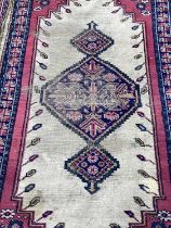 Two Eastern rugs with geometric decoration