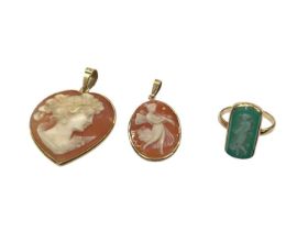 Two carved cameos in 18ct gold pendant mounts and a yellow metal cameo ring (3)