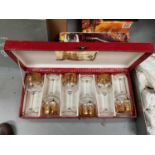 Cased set of Royal Doulton crystal champagne flutes, six Murano glass wine glasses with gilded decor
