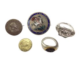 Georgian crown with enamel decoration and brooch fitting, one other coin brooch, a reproduction coin