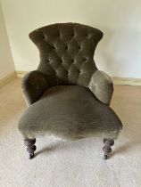 Victorian easy chair with buttoned back green velvet upholstery, on turned legs and castors