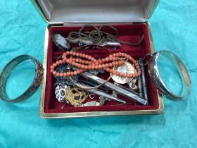 Coral bead necklace, silver bangles and bijouterie