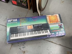 Yamaha PSR-330 electronic keyboard in box, together with stand.