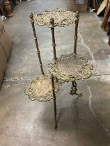 Victorian-style brass three tier plant stand