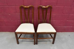 Unusual pair of 18th century red walnut side chairs