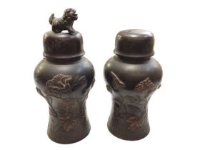 Pair of Chinese bronze miniature vases and covers
